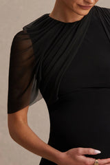 Amelise | Black High-Neck Maternity Maxi Dress With Mesh-Cape Sleeve And Sash Detail